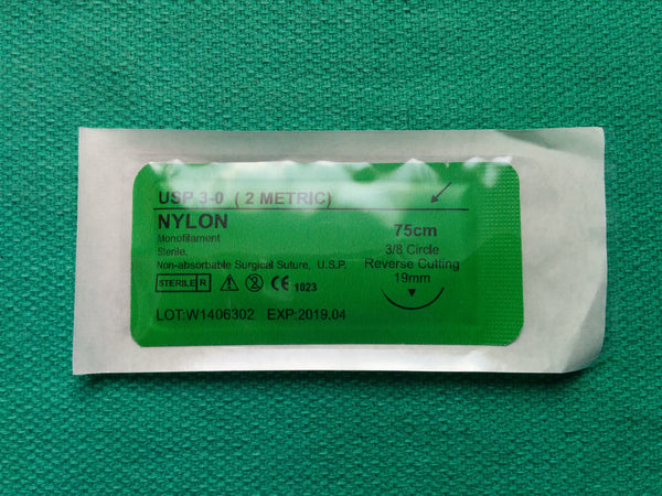 Surgical needle 3/8 (12mm / reverse cutting) with monofilament Surgical needle 3/8 (12mm / reverse cutting) with monofilament